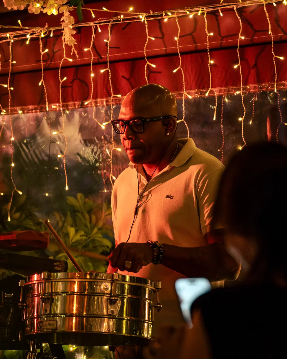 A percussionist on timbales during a live set at Pachamama