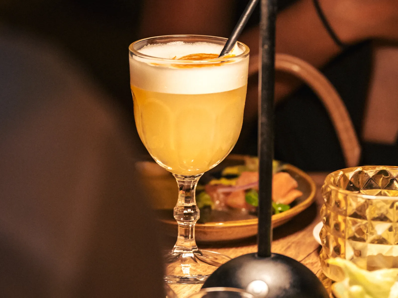 A classic pisco sour at Pachamama, foam capped with angostura bitters